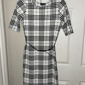 Tacera, black and white , knee length , stretchy dress with thin black belt